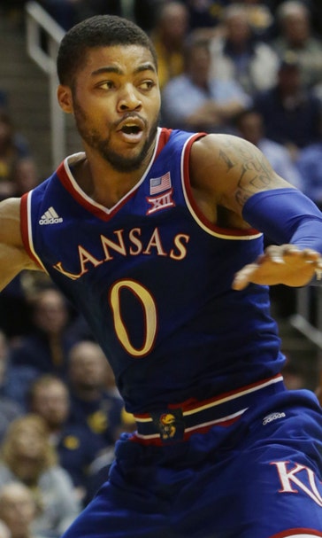 Down goes No. 1: West Virginia trips up Kansas 74-63